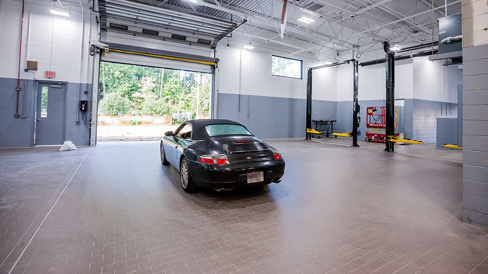 Service area flooring at Porsche auto dealership